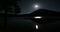 Fullmoon reflection timelapse on lake and snowy mountains