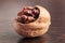 Fully focused walnut. Macro photo of cracked nut