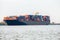 Fully laden container ship in port