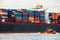 Fully laden container ship in port