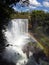 The Fumaca Smoke waterfall, with a rare dual rainbow, in Jalapao, Brazil