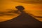 Fumarole on the volcano with red colors at sunrise