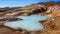 Fumaroles and boiling mud pools.