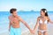 Fun on beach - couple in a happy relationship