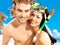 Fun beautiful couple at tropical beach with swimming mask
