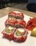 Fun beautiful sushi with red caviar on a plate with lemon