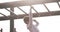 Fun, carefree and active little boy playing on monkey bars outdoors at a playground. Child having fun climbing, looking