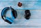 Fun gamepad video gamer player headset earphones and game mouse in the blue background