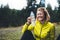 Fun girl quenches thirst after fitness. Smile person laughing drinking water from plastic bottles relax after exercising sport