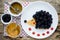 Fun and healthy breakfast for kids - edible hedgehog from pancake with peanut butter and fresh blackberry