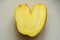 Fun heart shape potato on bright background