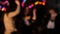 Fun party. Group of friends are relaxing, dancing and having fun in nightclub or musical concert. Abstract defocused
