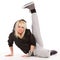 Fun pose by young street dancer girl in studio