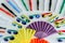 Fun set of fans and sunglasses of many colors for parties in summer