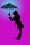 Fun silhouette of a woman holding umbrella