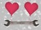 A fun of wrenches with pink heart balloon for fathers day.