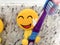 Fun yellow emoji smiling toothbrush holders for kids