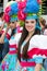 Funchal, Madeira - April 20, 2015: Beautiful young women with flower headdress at the Madeira Flower Festival, P