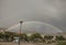 Funchal, Madeira - a full rainbow and dark skies.