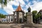 FUNCHAL, MADEIRA, PORTUGAL - SEPTEMBER 10, 2017: Joao GonÃ§alves Zarco statue in front of the bank of Portugal