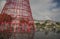 Funchal, Madeira - a red, metal Christmas tree and a rainbow.