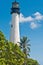 Functioning, tropical lighthouse with three windows, metal walk around