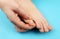 Fungus of foot close-up, isolated on blue background. The concept dermatology, treatment fungal and fungal infections in humans.