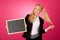 Funky business woman holding a blank blackboard - teacher