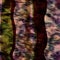 Funky camouflage space dyed style texture material. Seamless colorful boho batik pattern. Mottled modern tie dye fashion