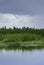 A funnel cloud or waterspout over the Louisiana marsh