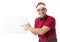 Funny 40s to 50s crazy sales man in Santa Christmas hat with bo