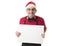 Funny 40s to 50s crazy sales man in Santa Christmas hat with bo