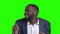 Funny afro-american businessman on green screen.