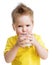 Funny angry kid drinking dairy product