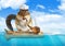 Funny animal chipmunk dressed sailor, floating ocean