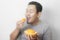 Funny Asian Man Enjoys Durian fruit