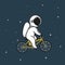 Funny astronaut rides on bicycle