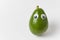 Funny avocado with Googly eyes on white background. Diet proper nutrition concept