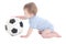 Funny baby boy toddler playing with soccer ball isolated on whit