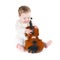 Funny baby girl playing with a big violin