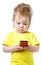 Funny baby looks at the screen of the smartphone