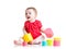 Funny baby playing with colourful cup toys