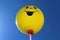 Funny balloon in front of the sky
