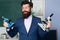 Funny bearded teacher, student hold microscope. Positive human emotions facial expressions.