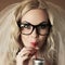 Funny beautiful hipster bride drinking something