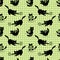 Funny black kittens playing with clews. Seamless pattern on green checked background