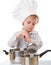 A funny boy is portraying a cook