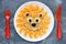 Funny breakfast idea lion pancake with tangerines