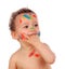 Funny child dirty with paint