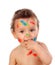 Funny child dirty with paint